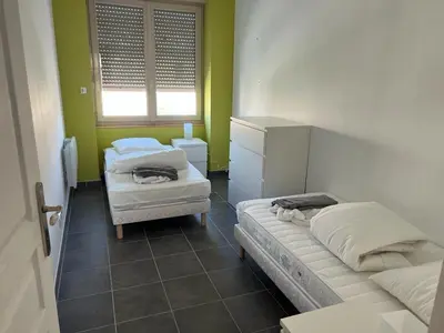 Un ou plusieurs lits dans un hébergement de l'établissement Duplex spacieux au centre du village 205