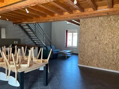 Coin salon dans l'établissement Duplex spacieux au centre du village 205