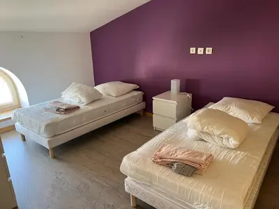 Un ou plusieurs lits dans un hébergement de l'établissement Duplex spacieux au centre du village 205