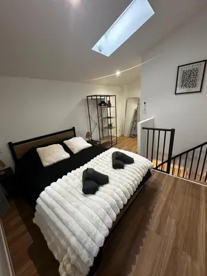 Un ou plusieurs lits dans un hébergement de l'établissement Duplex en hyper centre, calme, accès autonome