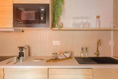 Cuisine ou kitchenette dans l'établissement Suite Bali Prestige- SPA & Sauna