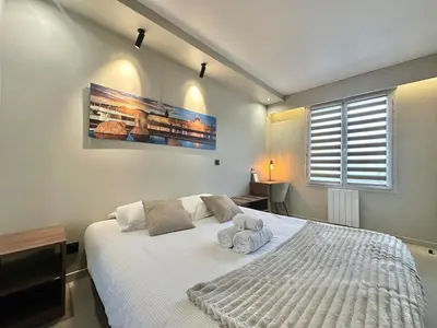 Un ou plusieurs lits dans un hébergement de l'établissement Balcon et Design urbain - Lyon et Metro