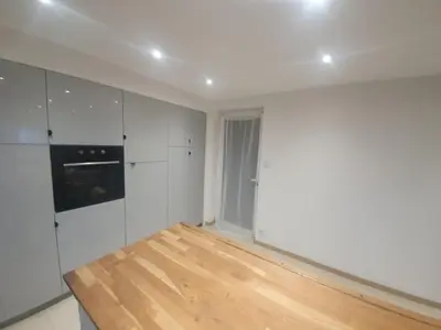 Cuisine ou kitchenette dans l'établissement Appartement cosy avec parking privé
