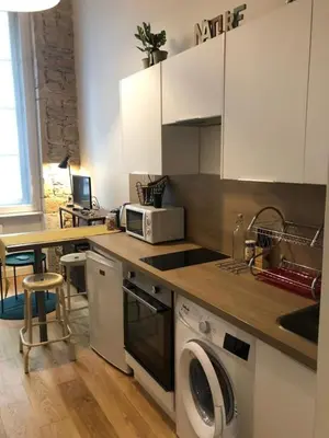Cuisine ou kitchenette dans l'établissement Le Joseph Métro Hôtel de Ville