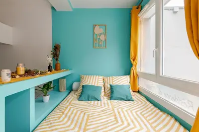 Un ou plusieurs lits dans un hébergement de l'établissement Le Petit Cocoon - Calme - Parking -Tram - Terrasse - Lyon - OL - Eurexpo
