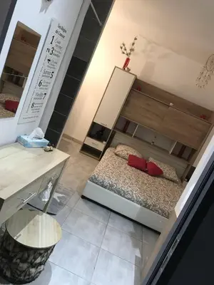 Un ou plusieurs lits dans un hébergement de l'établissement Appartement confortable au coeur du village 204