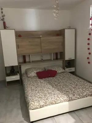 Un ou plusieurs lits dans un hébergement de l'établissement Appartement confortable au coeur du village 204