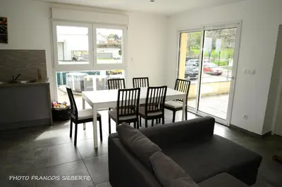 Coin salon dans l'établissement Appartement confortable dans un environnement calme et paisible 101