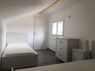 Un ou plusieurs lits dans un hébergement de l'établissement Appartement confortable dans un environnement calme et paisible 101