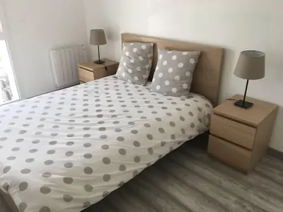 Un ou plusieurs lits dans un hébergement de l'établissement Appartement confortable dans un environnement calme et paisible 101