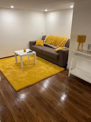 Coin salon dans l'établissement Appartement cosy