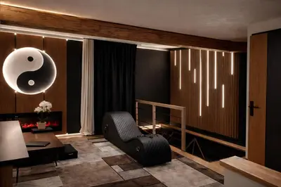 Coin salon dans l'établissement Suite Spa et Jeux de Cogny