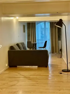 Coin salon dans l'établissement APPARTEMENT Centre Ville