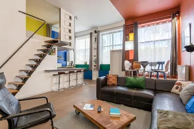Coin salon dans l'établissement Superb Loft with unique design heart of Lyon