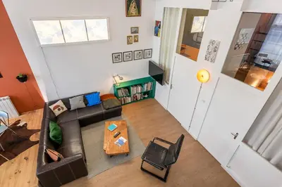 Coin salon dans l'établissement Superb Loft with unique design heart of Lyon