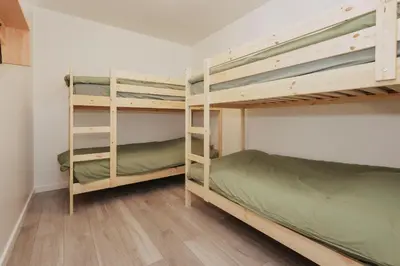 Un ou plusieurs lits dans un hébergement de l'établissement La bâtisse des tuileries côté vigne