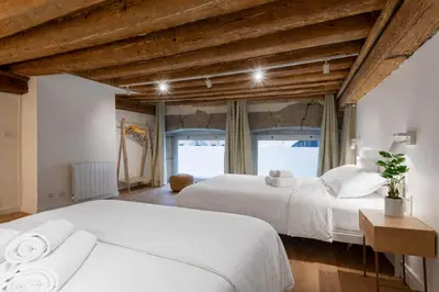Un ou plusieurs lits dans un hébergement de l'établissement Duplex moderne et chaleureux