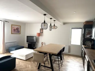 Cuisine ou kitchenette dans l'établissement Charmant Appartement Terrasse et parking