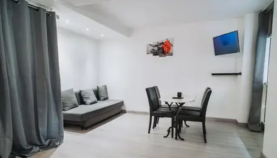 Coin salon dans l'établissement Appartement T2 Charpennes proche métro
