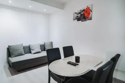 Coin salon dans l'établissement Appartement T2 Charpennes proche métro
