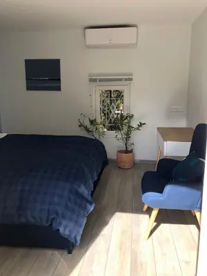 Coin salon dans l'établissement 1 chambre indépendante dans maison