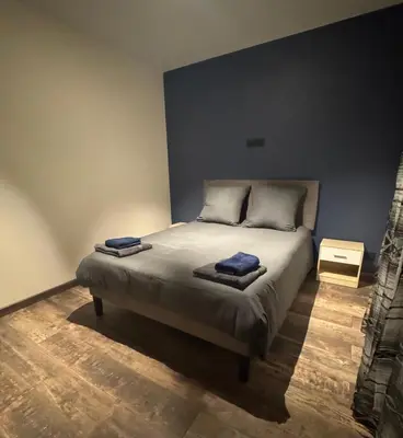 Un ou plusieurs lits dans un hébergement de l'établissement Maison au calme à Pont-Évêque