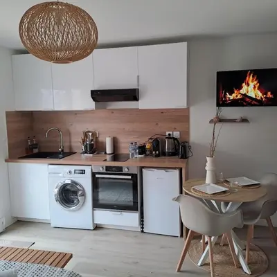Cuisine ou kitchenette dans l'établissement Studio moderne proche Lyon et aéroport