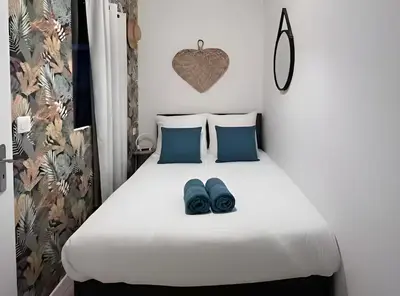 Un ou plusieurs lits dans un hébergement de l'établissement PARAKALO - PartDieu l Bureau l Calme by Dreamy Flat Lyon