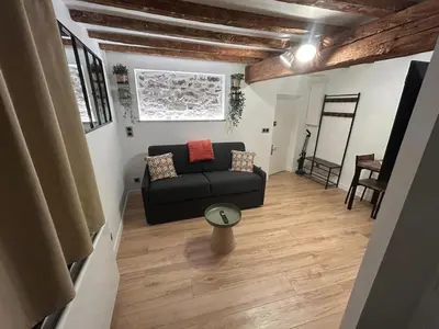 Coin salon dans l'établissement La Petite Porte du Bonheur