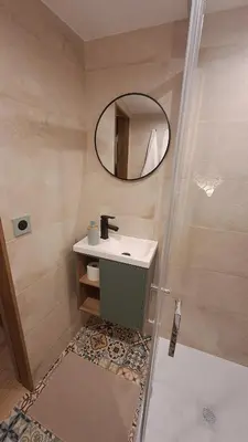 Salle de bains dans l'établissement La Petite Porte du Bonheur