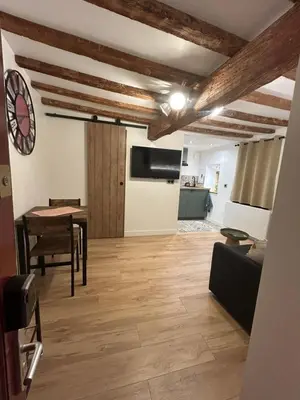 Cuisine ou kitchenette dans l'établissement La Petite Porte du Bonheur