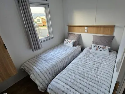 Un ou plusieurs lits dans un hébergement de l'établissement Apartment Die Ufer der Rhone by Interhome