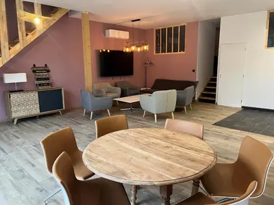 Coin salon dans l'établissement Gite de la grange