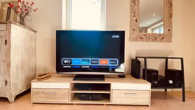 Télévision ou salle de divertissement dans l'établissement Villa L'Hermitière - 4 étoiles