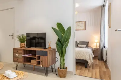 Un ou plusieurs lits dans un hébergement de l'établissement Le Mado, Charming two-room apartment in a great location