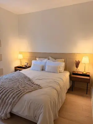 Un ou plusieurs lits dans un hébergement de l'établissement Appartement Jazz - Hyper Centre Vienne - Garage