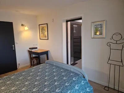 Un ou plusieurs lits dans un hébergement de l'établissement Clos Merise - appartement de 3 chambres