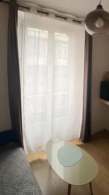 Télévision ou salle de divertissement dans l'établissement Suite Soleil Doré