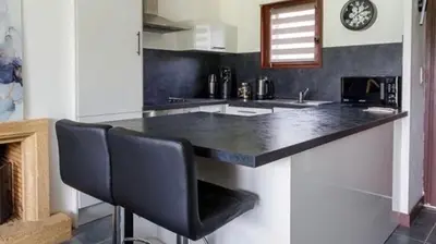 Cuisine ou kitchenette dans l'établissement Suite Soleil Doré