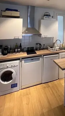 Cuisine ou kitchenette dans l'établissement Suite Soleil Doré