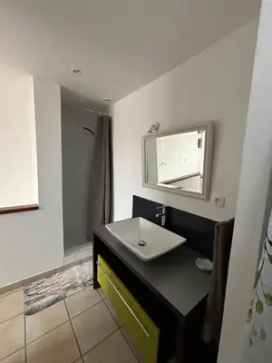 Un ou plusieurs lits dans un hébergement de l'établissement Maison 3 appartements