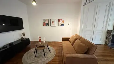Télévision ou salle de divertissement dans l'établissement 128 Thiers 2 Chambres Brotteaux