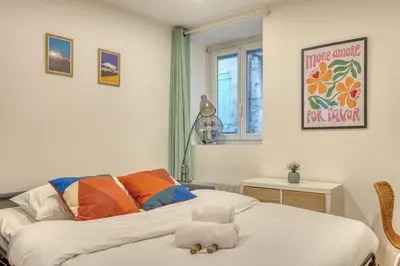 Un ou plusieurs lits dans un hébergement de l'établissement LAristote - Studio cosy - Proche de Lyon - Wifi inclus