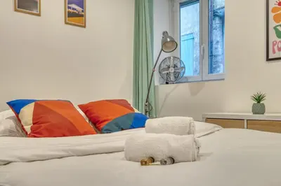 Un ou plusieurs lits dans un hébergement de l'établissement LAristote - Studio cosy - Proche de Lyon - Wifi inclus