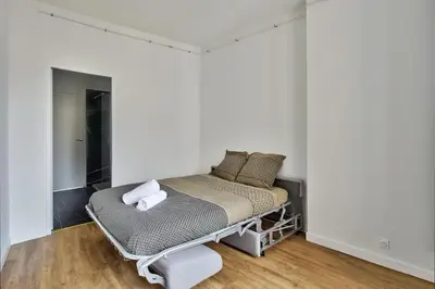 Un ou plusieurs lits dans un hébergement de l'établissement Somptueux appartment Lyon-brotteaux