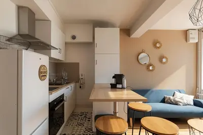 Cuisine ou kitchenette dans l'établissement La Bonne Adresse - T2 - Montluel