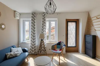 Coin salon dans l'établissement La Bonne Adresse - T2 - Montluel