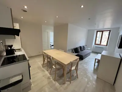 Cuisine ou kitchenette dans l'établissement Signature Apartment