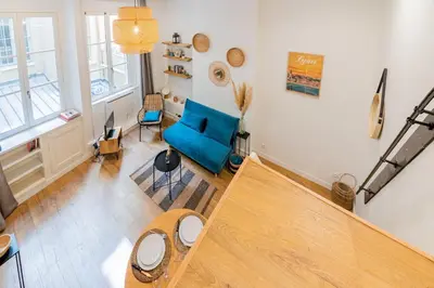 Coin salon dans l'établissement GuestReady - Modern Studio in The Heart of La Presqu'île