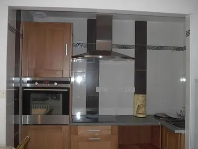 Cuisine ou kitchenette dans l'établissement Studio le clos de Louze